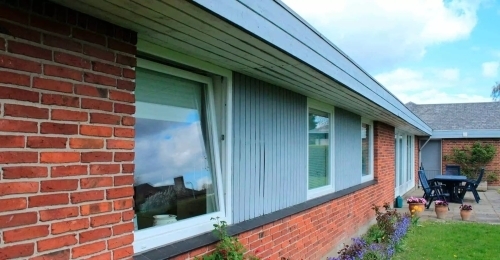 PVC dreje/kip vinduer monteret i bolig med klassisk facade